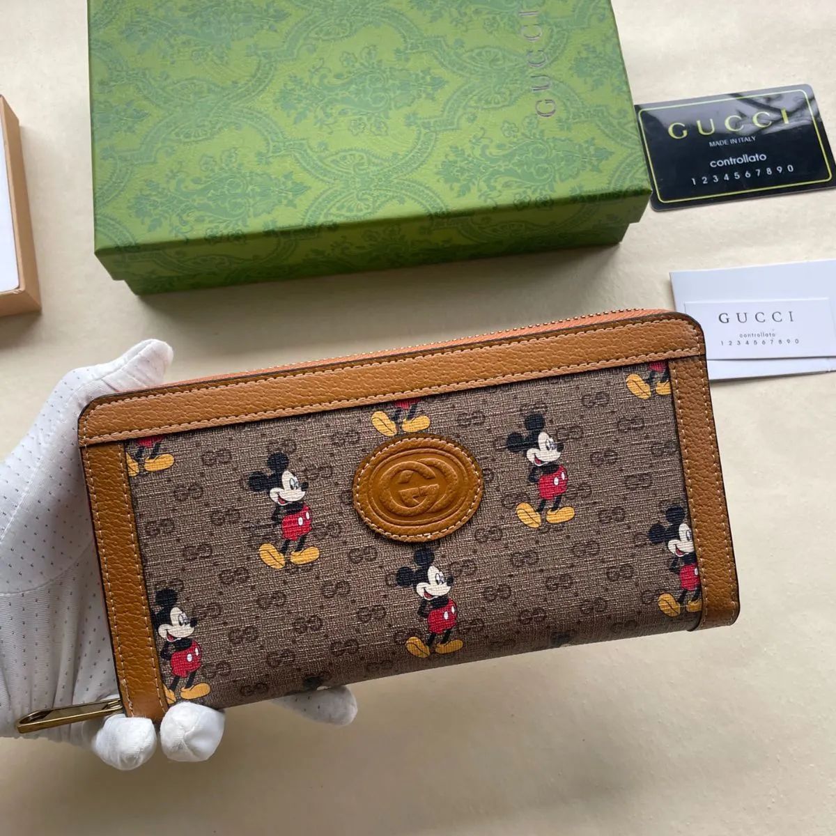 GUCCI グッチ GGスプリーム ディズニーコラボ ラウンドファスナー長財布 ミッキー PVC×レザー ブラウン系 - メルカリ