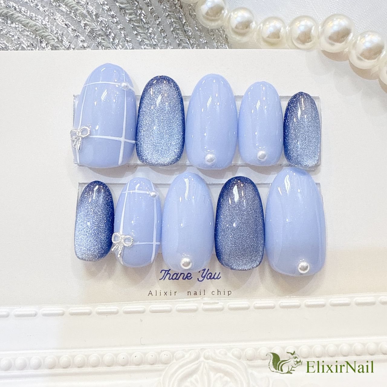 現品】ネイルチップ 青 水色 チェック リボン - メルカリ