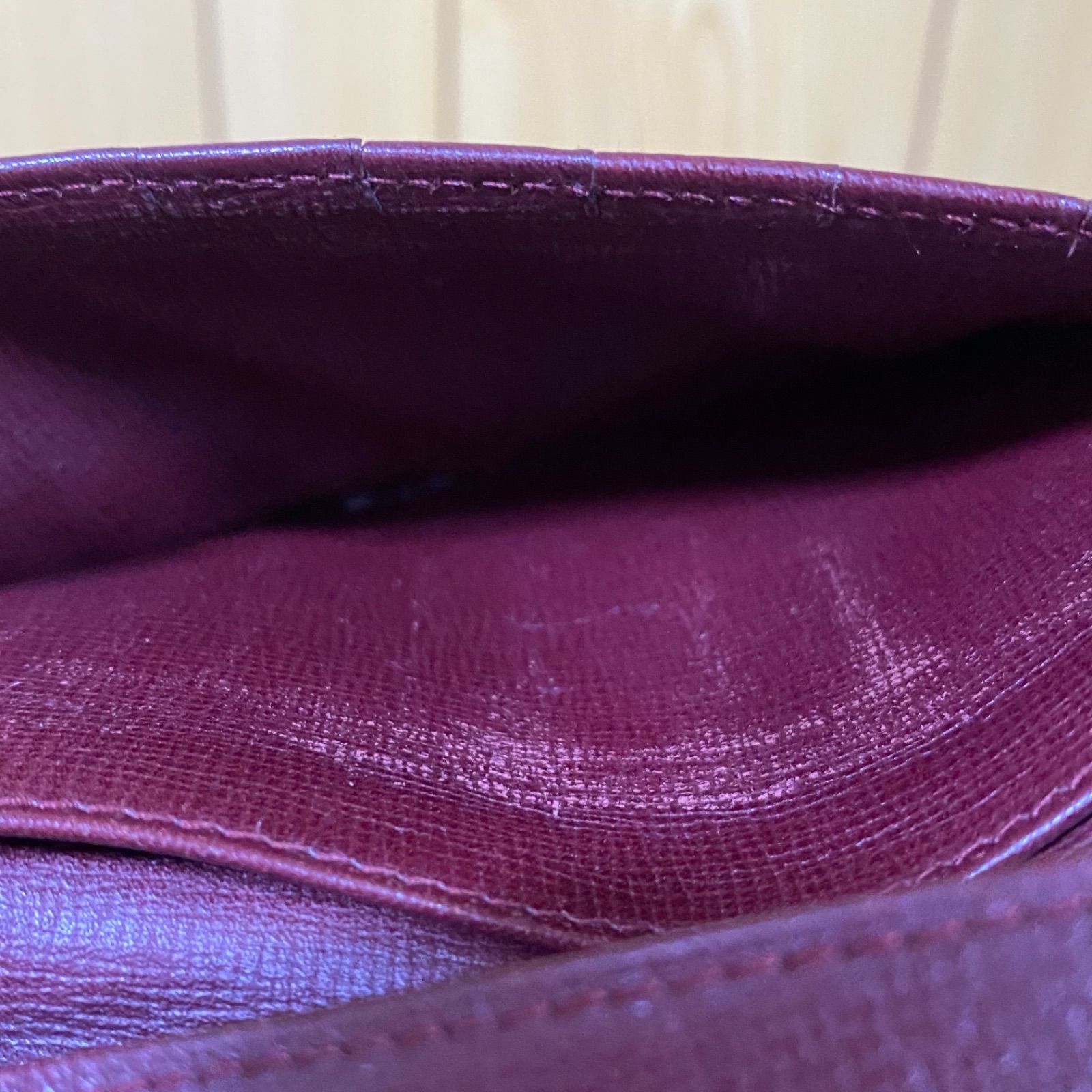 55 cartier カルティエ 二つ折り財布 マストライン レザー ボルドー系