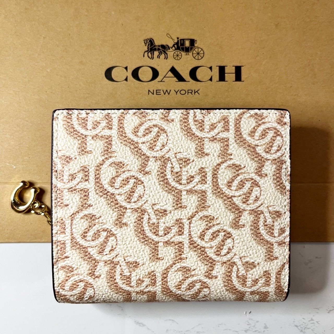 全国で中古品 COACH シグネチャー モノグラム プリント二つ折り財布