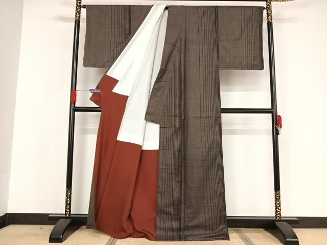 平和屋着物○本場大島紬 純泥染 手織 一元絣 縞 こしま大島紬謹製 証紙