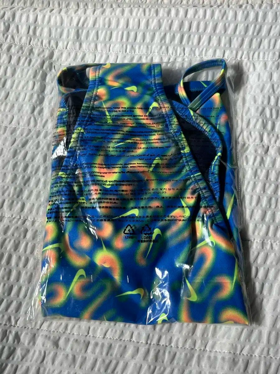 ナイキ スウッシュ ダイブ カットアウト オレンジパール 28