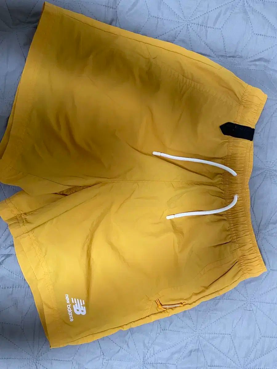 ニューバランス メンズ 黄色 ハーフパンツ サイズ S