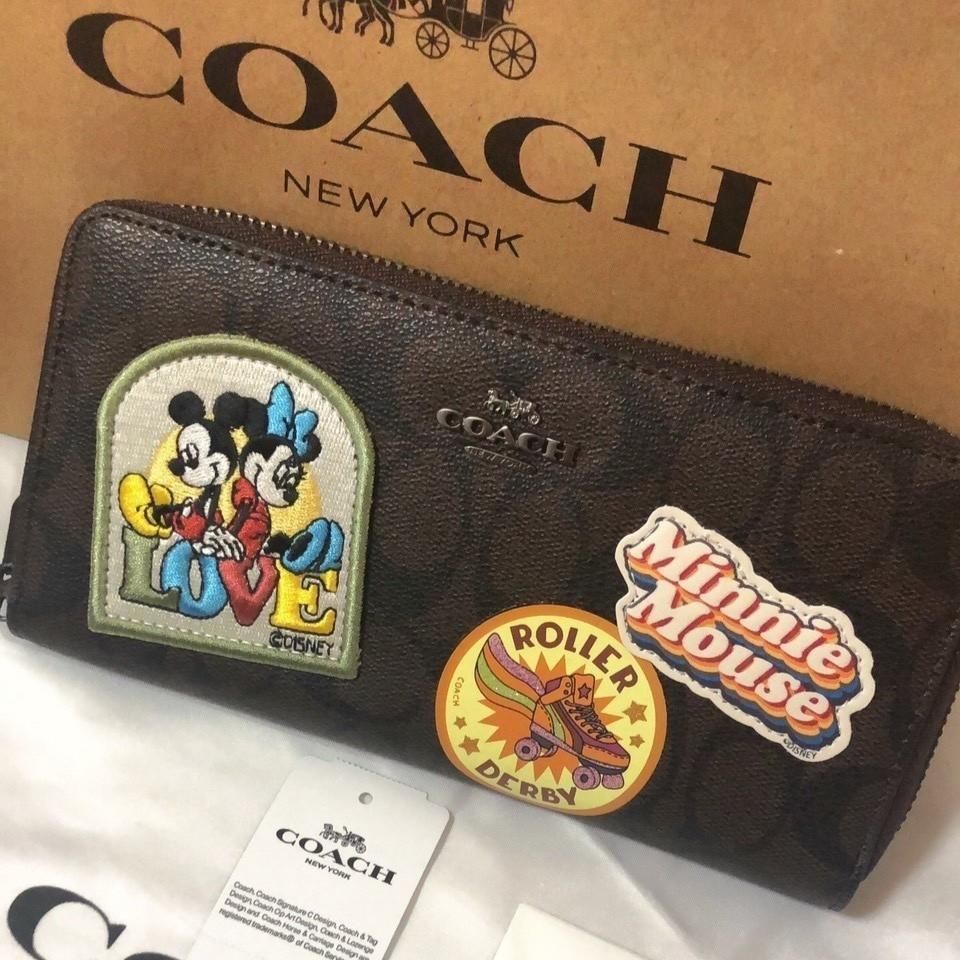 メルカリshops 新品未使用 Coach コーチ ディズニーコラボ長財布