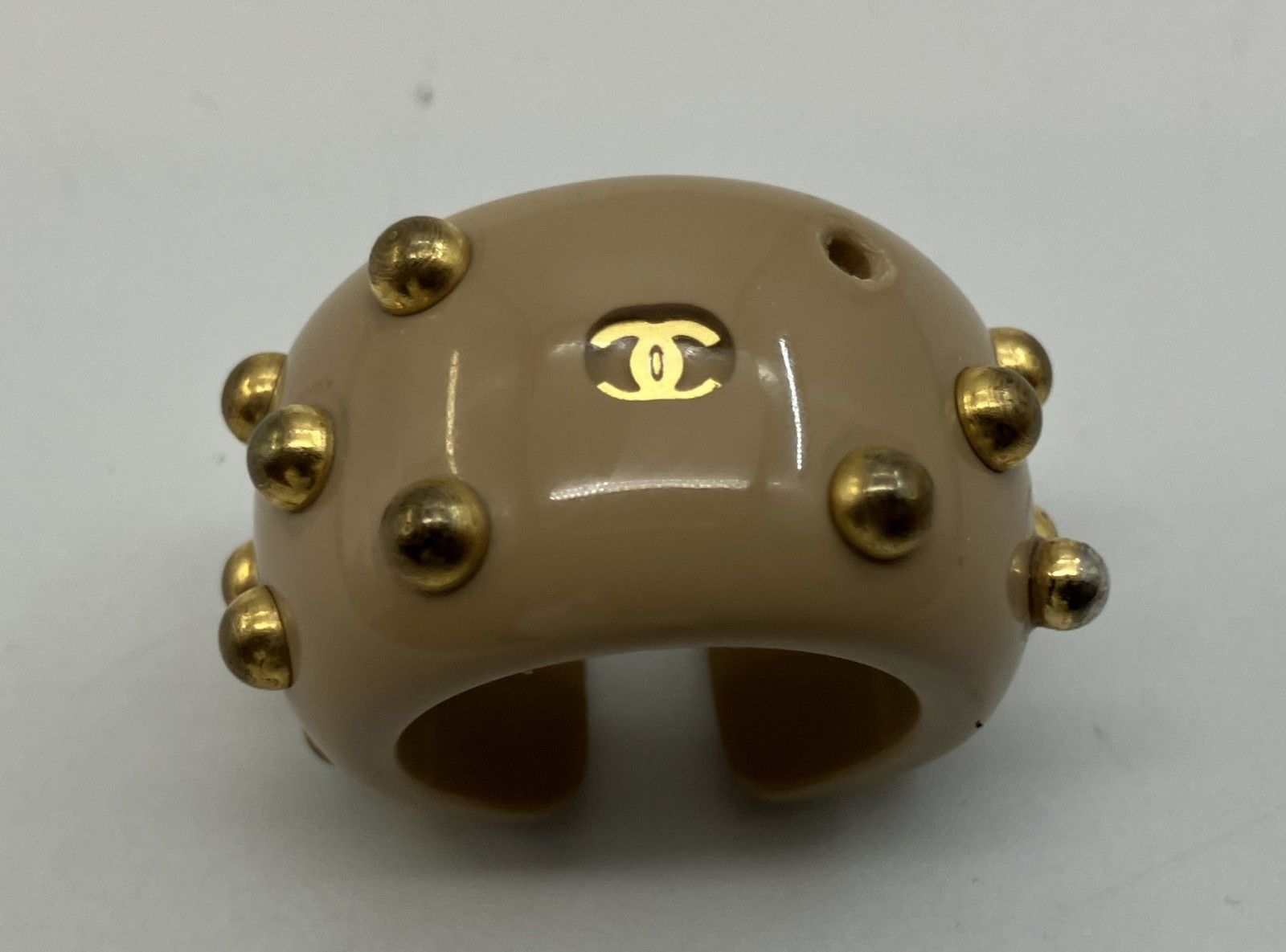 CHANEL スタッズ付きリング Chanel 22S Gold Crystal Star Interlocking CC Logo Metal