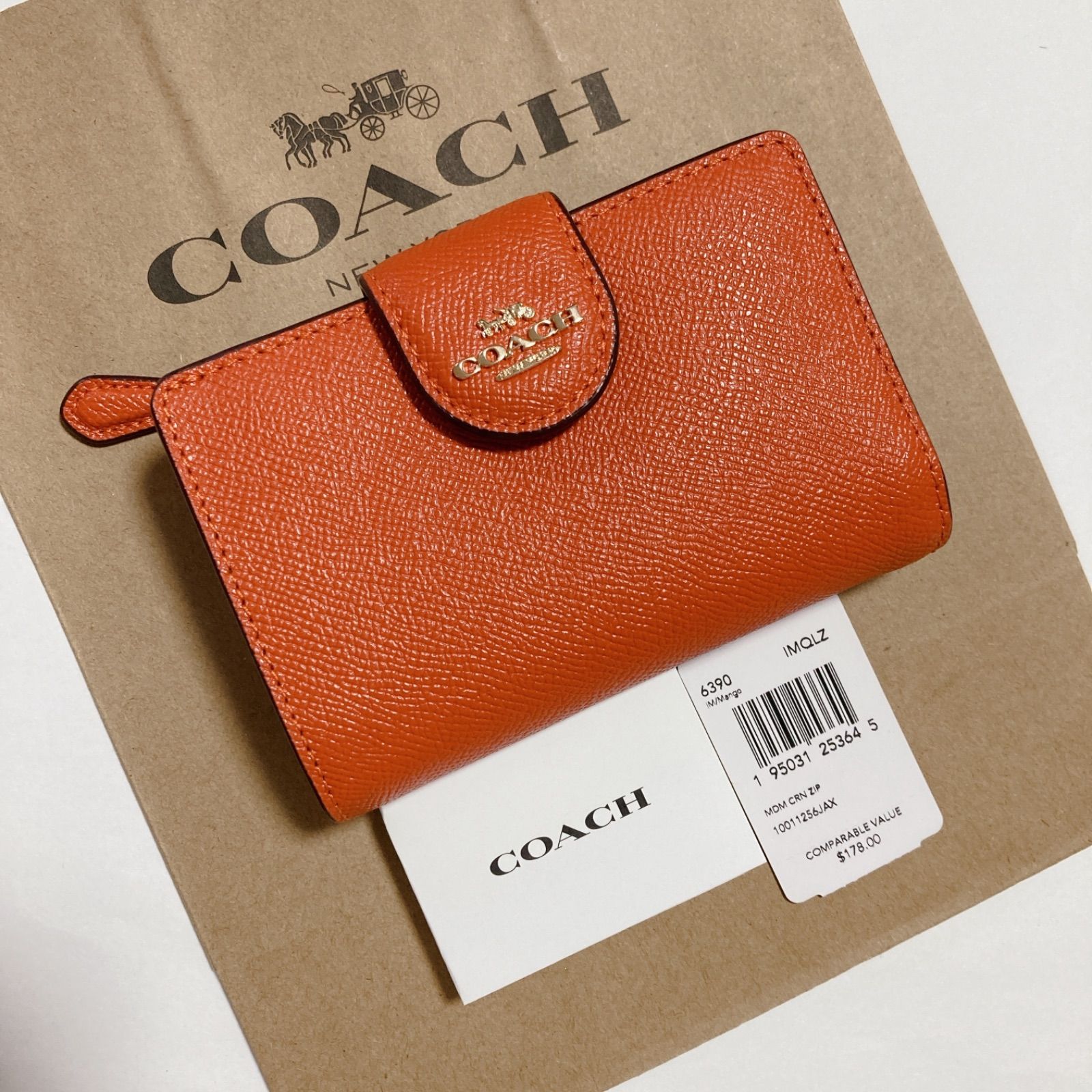 COACH コーチ マンゴー オレンジ 二つ折り財布 折り財布 - メルカリ