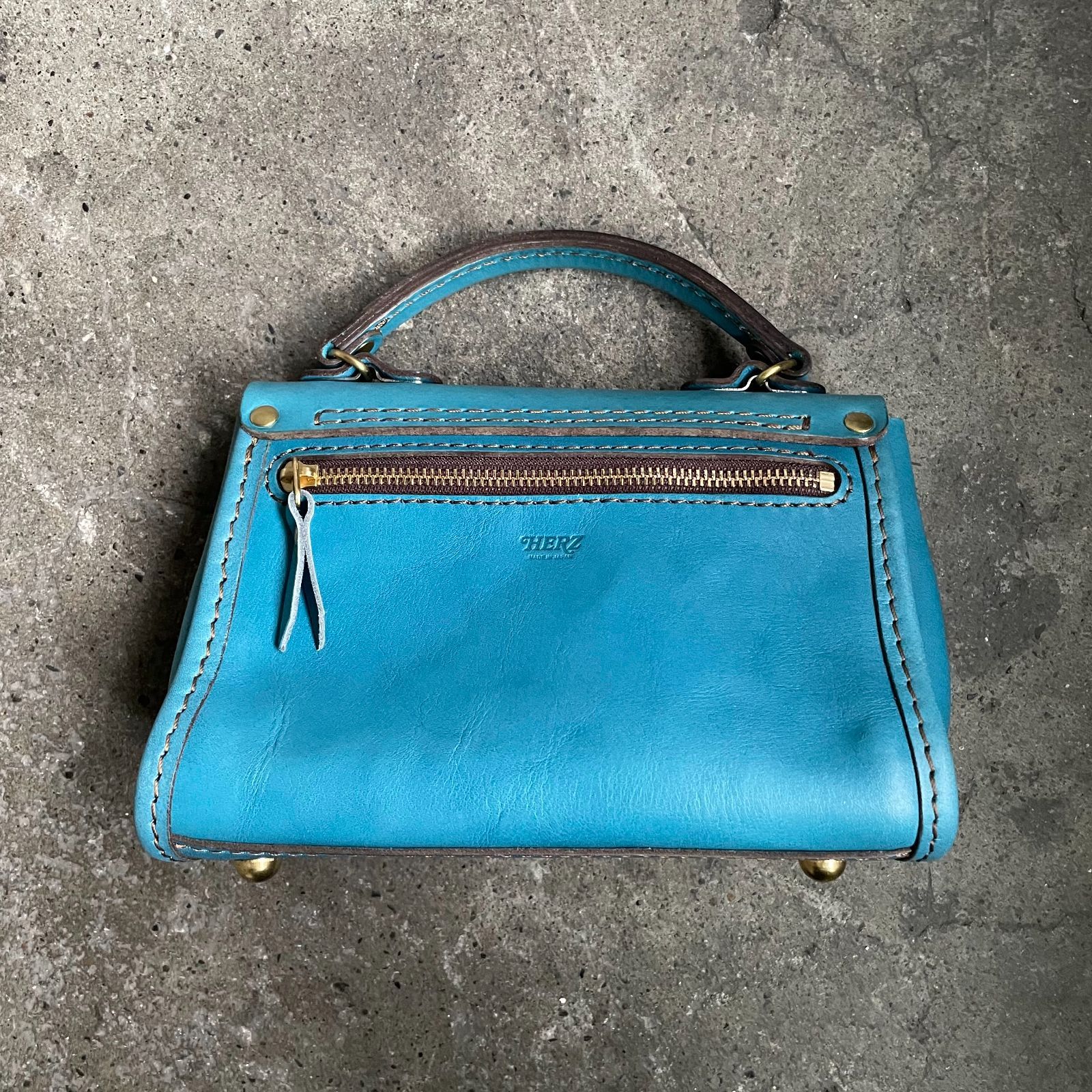 HERZ 2025春夏限定色 プチミニョン セルリアンブルー ハンドバッグ