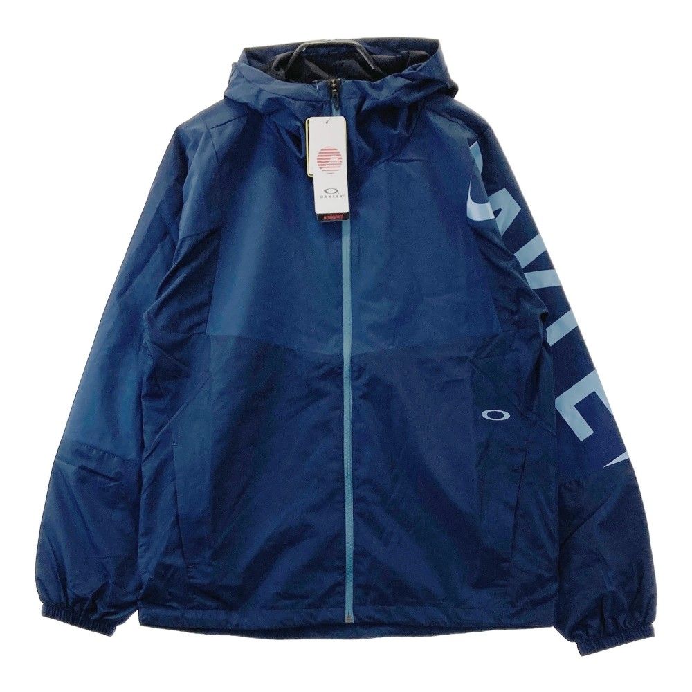 サイズ：XL OAKLEY オークリー FOA406887 ジップジャケット  ネイビー系 [240101460579] ゴルフウェア メンズ ストスト サイズ：XL OAKLEY オークリー FOA406887 ジップジャケット