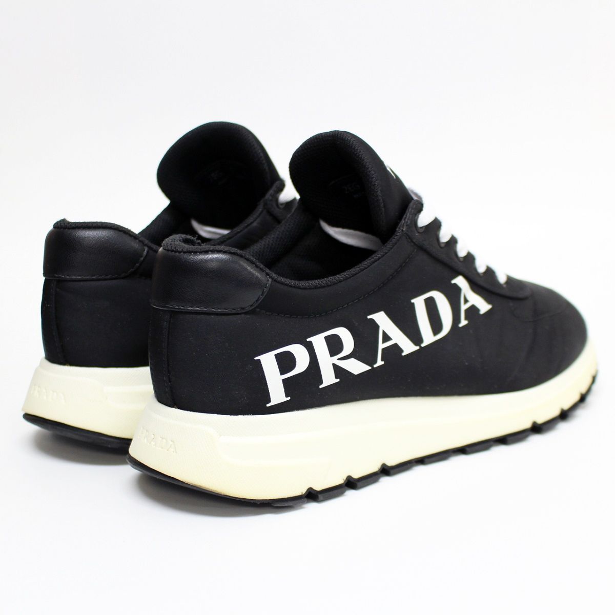 送料無料 PRADA プラダ 中古 2EG 363 ナイロン ロゴ スニーカー size 7(日本サイズ26.0～26.5程度) - メルカリ