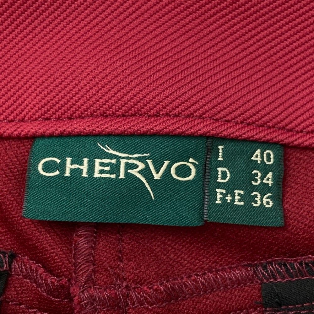 サイズ：40 CHERVO シェルボ  パンツ  レッド系 [240101449103] ゴルフウェア レディース ストスト サイズ：40 CHERVO シェルボ パンツ レッド系 [240101449103