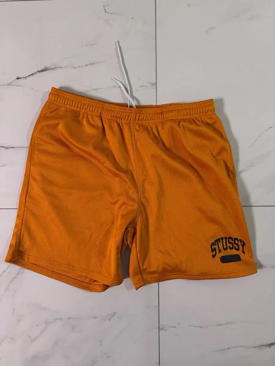 STUSSY(ステューシー) アーチ メッシュ ショートパンツ オレンジ XL
