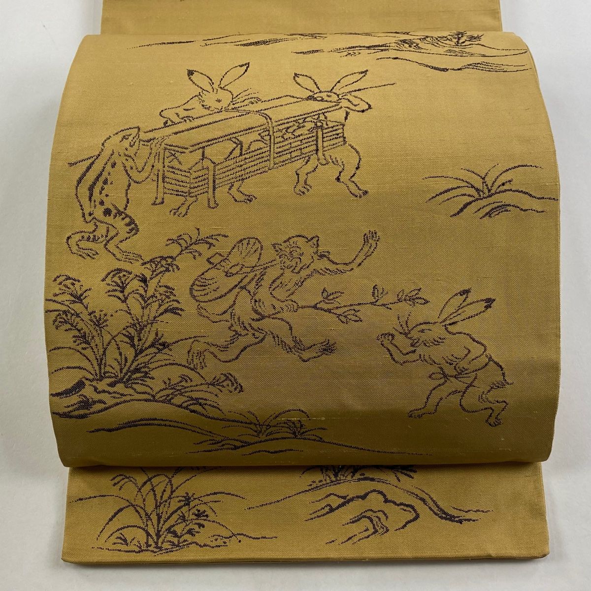 袋帯 名品 鳥獣戯画 山吹茶色 お太鼓柄 正絹