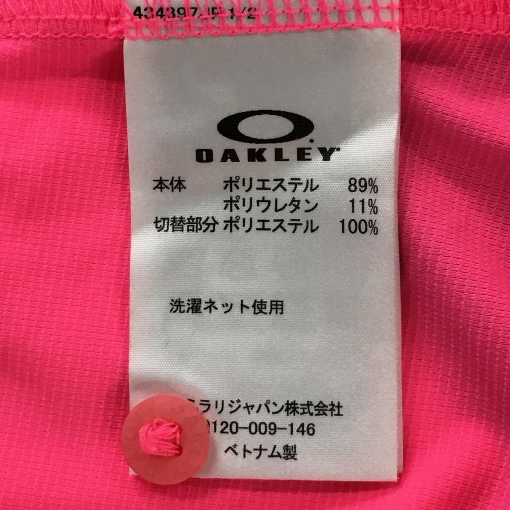 Oakley - 【超美品】オークリー 半袖ポロシャツ 蛍光ピンク×ネイビー 背面切替   メンズ L ゴルフウェア Oakley Oakley - 【超美品】オークリー 半袖ポロシャツ 蛍光ピンク