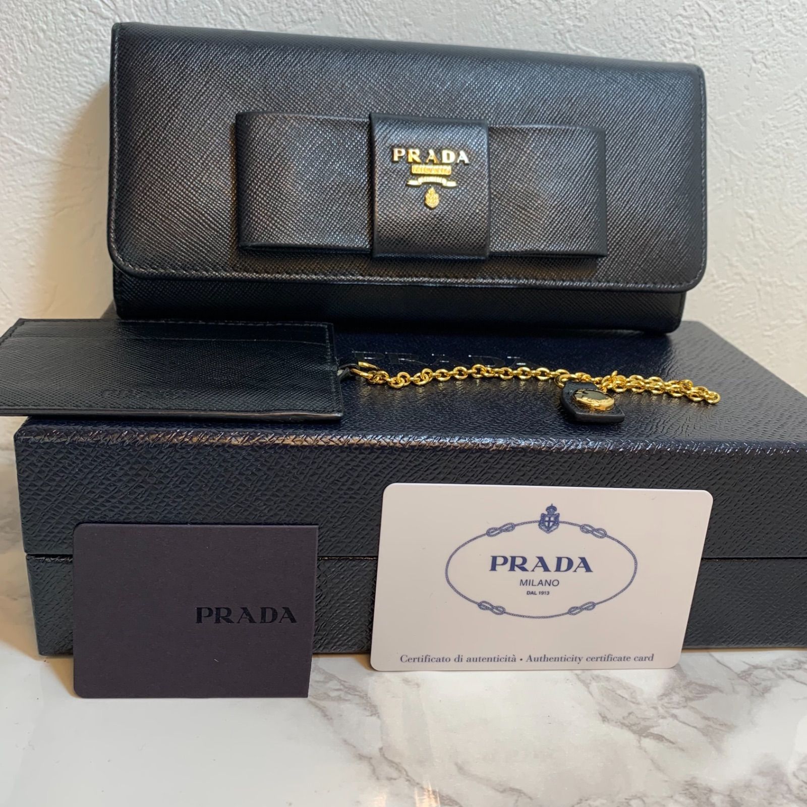 美品 正規品】PRADA リボン 長財布 プラダ サフィアーノ フィオッコ 