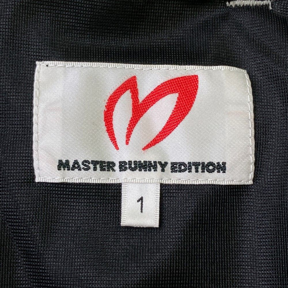 サイズ：1 MASTER BUNNY EDITION マスターバニーエディション  蓄熱 ウールパンツ  グレー系 [240101428643] ゴルフウェア レディース ストスト マスターバニー×バットマン パンツ グレー×黒 サイドロゴ ウール