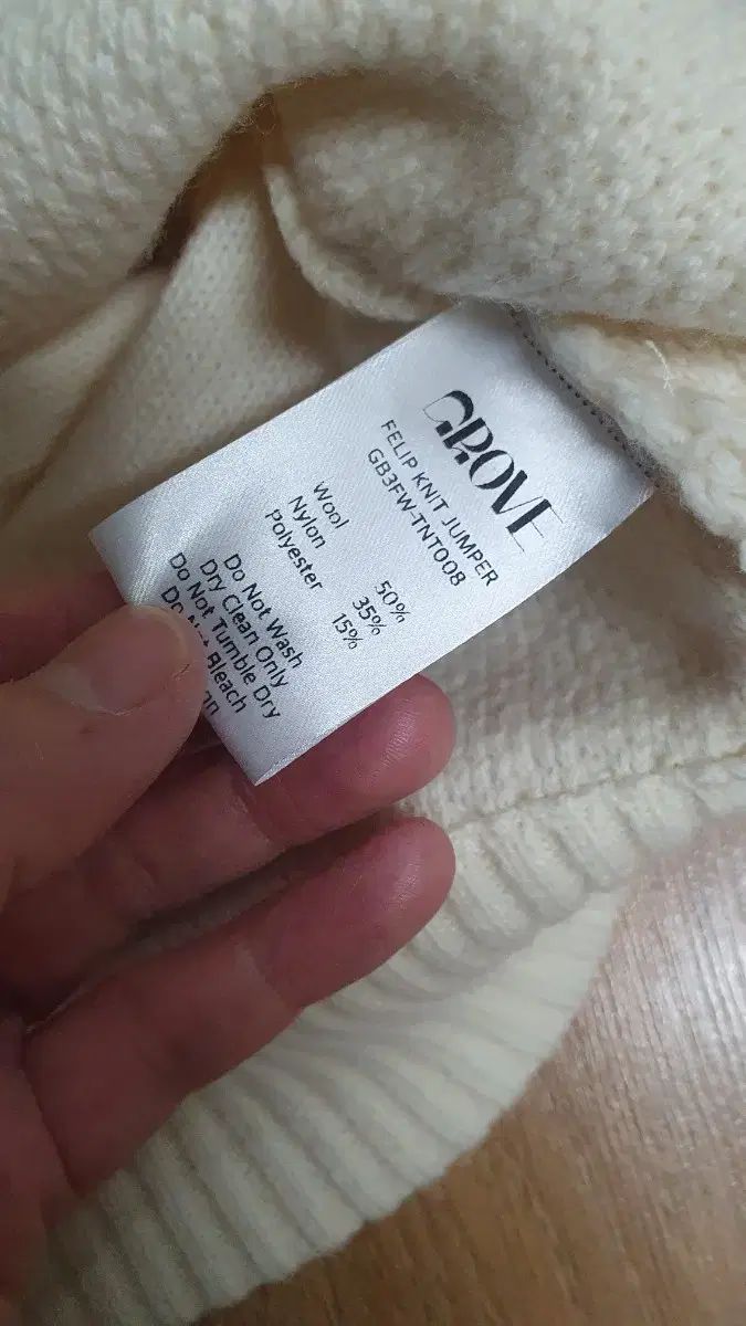 ブークレ カーディガン