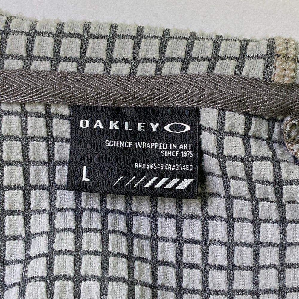 サイズ：L OAKLEY オークリー 461358JP ジップジャケット  グレー系 [240101461251] ゴルフウェア メンズ ストスト サイズ：L OAKLEY オークリー 461358JP ジップジャケット グレー