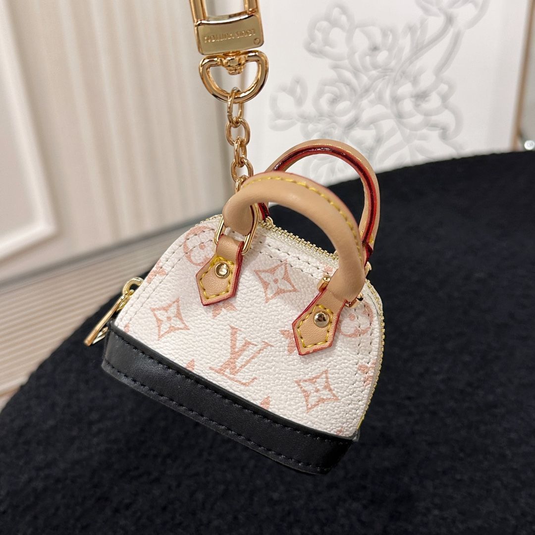 新品未使用 LOUIS VUITTON ルイヴィトン モノグラムレザーバッグチャーム バッグチャーム・ミクロ アルマ キーホルダー - メルカリ