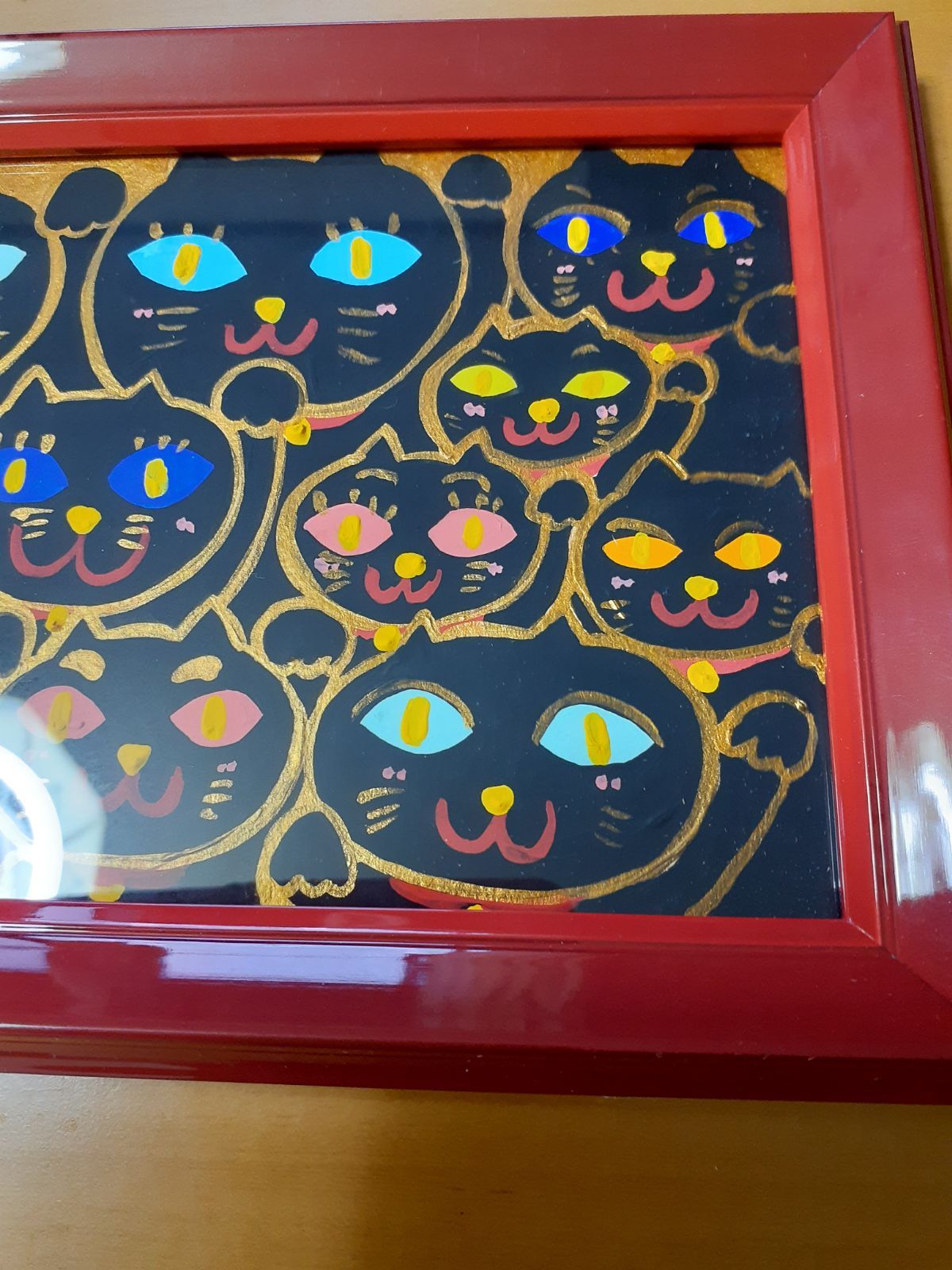 ハッピー黒の招き猫 赤い額付き 21×16cm幅2cm 小楠アキコ作品