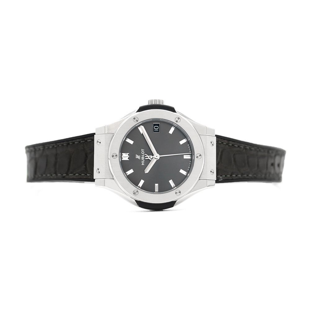 電池交換済 HUBLOT ウブロ クラシックフュージョン チタニウム 581.NX.7071.LR デイト 100m防水 グレー Ti チタン 純正ベルト 純正尾錠 レディース クォーツ【6ヶ月保証】【腕時計】【中古】 HUBLOT - 電池交換済 HUBLOT ウブロ クラシックフュージョン