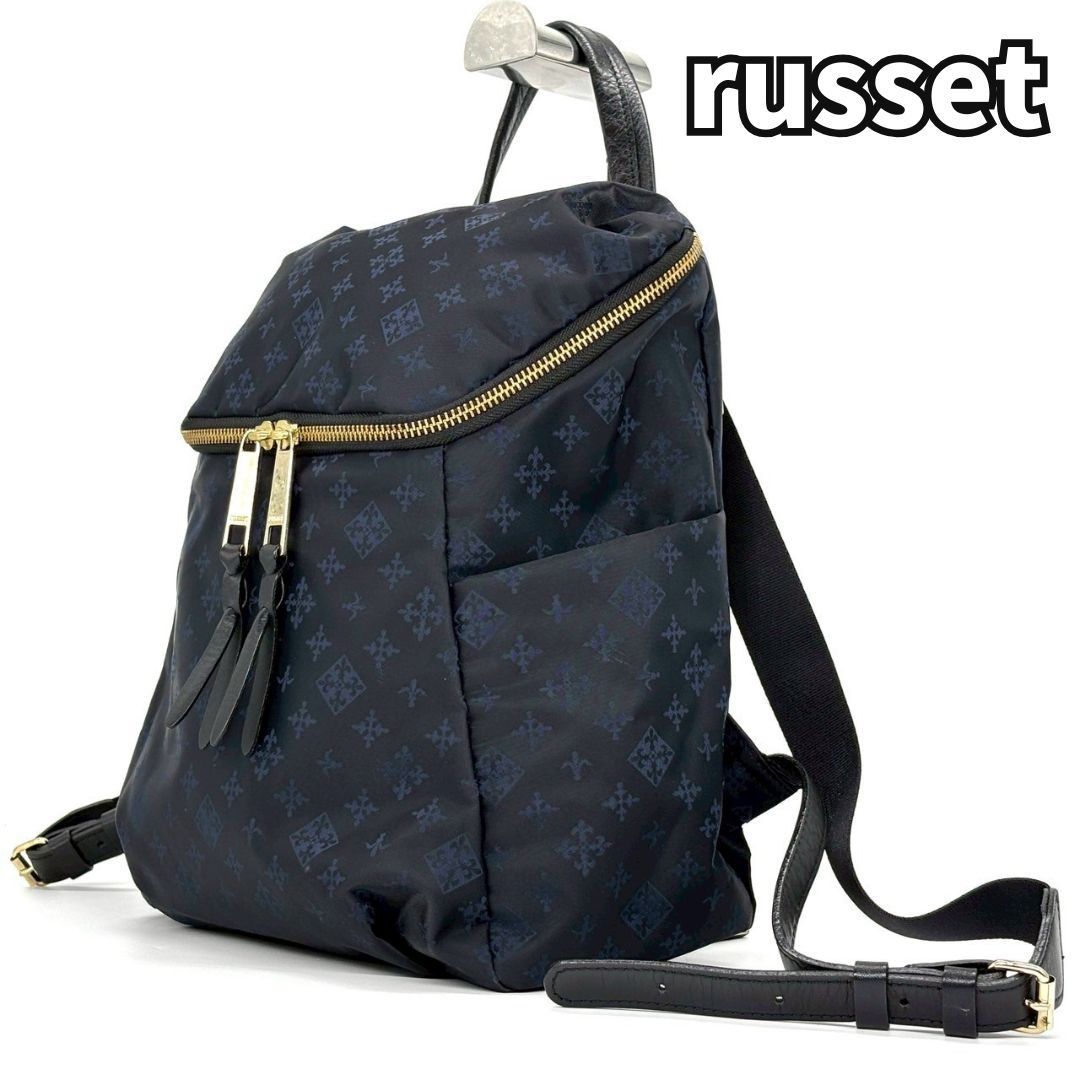 【美品】ラシット リュック バッグパックモノグラム 総柄 ナイロン レザー Russet - ✨訳あり✨russet ラシット リュック ナイロン 総柄