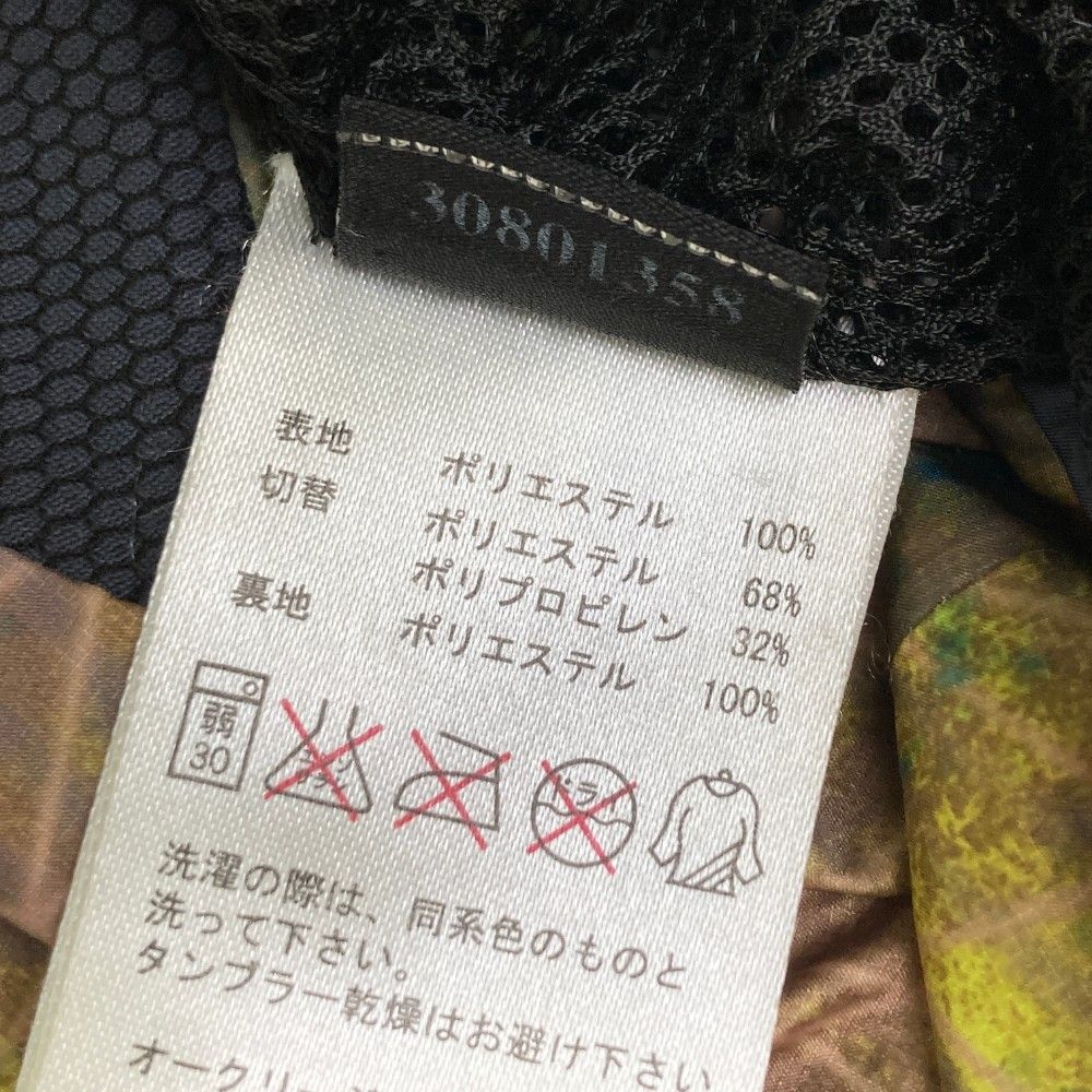サイズ：L OAKLEY オークリー  2WAY裏メッシュ ジップジャケット 総柄 ブラウン系 [240101465640] ゴルフウェア メンズ ストスト サイズ：L OAKLEY オークリー 2WAY裏メッシュ ジップジャケット