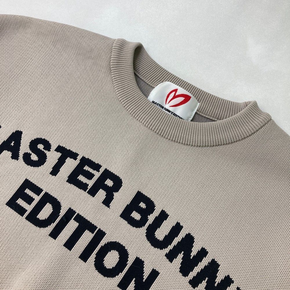 サイズ：0 MASTER BUNNY EDITION マスターバニーエディション 2024年モデル フロントロゴ 長袖ニットセーター  グレー系 [240101471870] ゴルフウェア レディース ストスト サイズ：0 MASTER BUNNY EDITION マスターバニーエディション