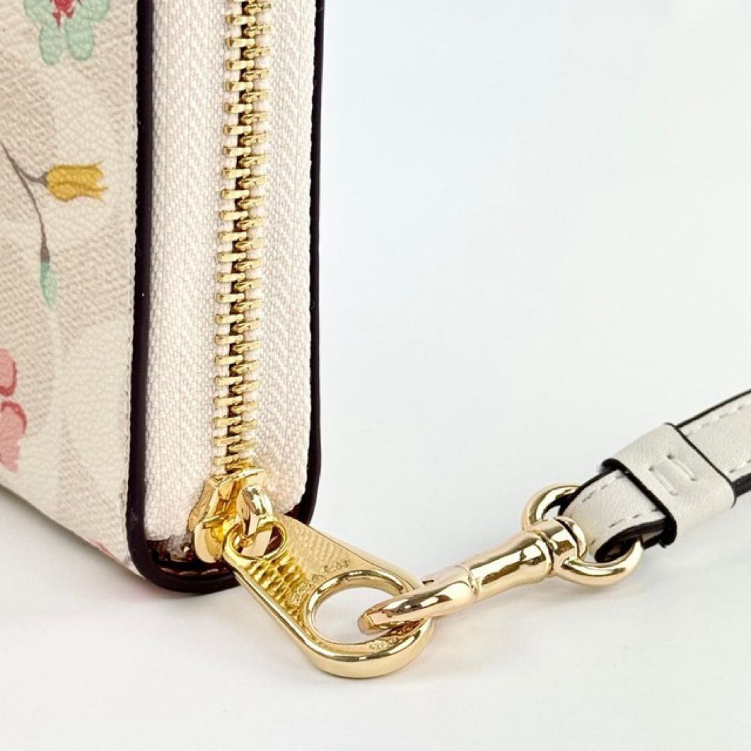 【新品未使用】COACH 花柄 シグネチャー 長財布 リストレット 白ホワイト 新品・正規品】COACH 花柄リストレット長財布 ホワイト 保存袋・ケア