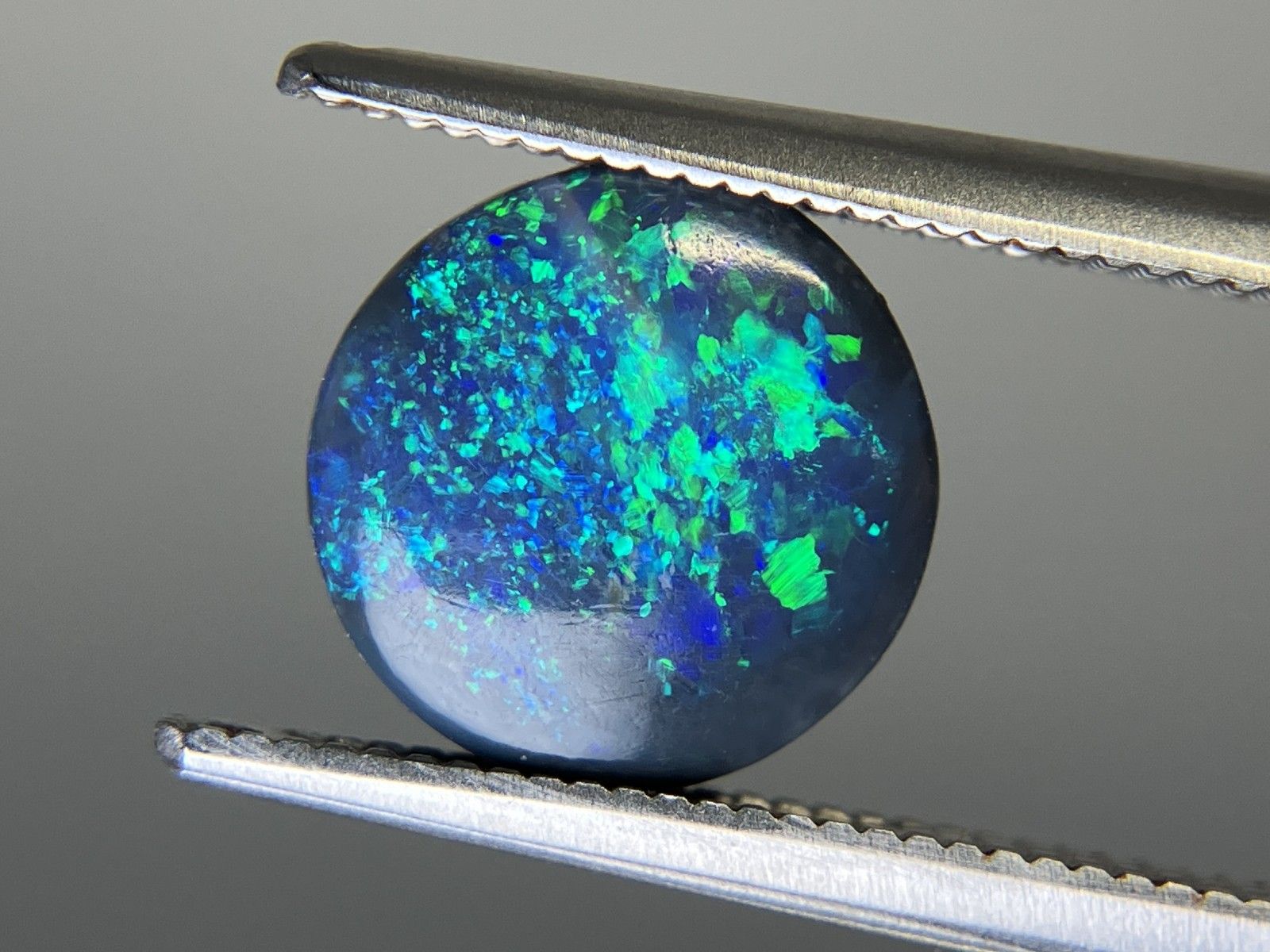 ブラックオパール 天然 1.418ct 中央宝石ソーティング付き 9.2㎜×9.0  