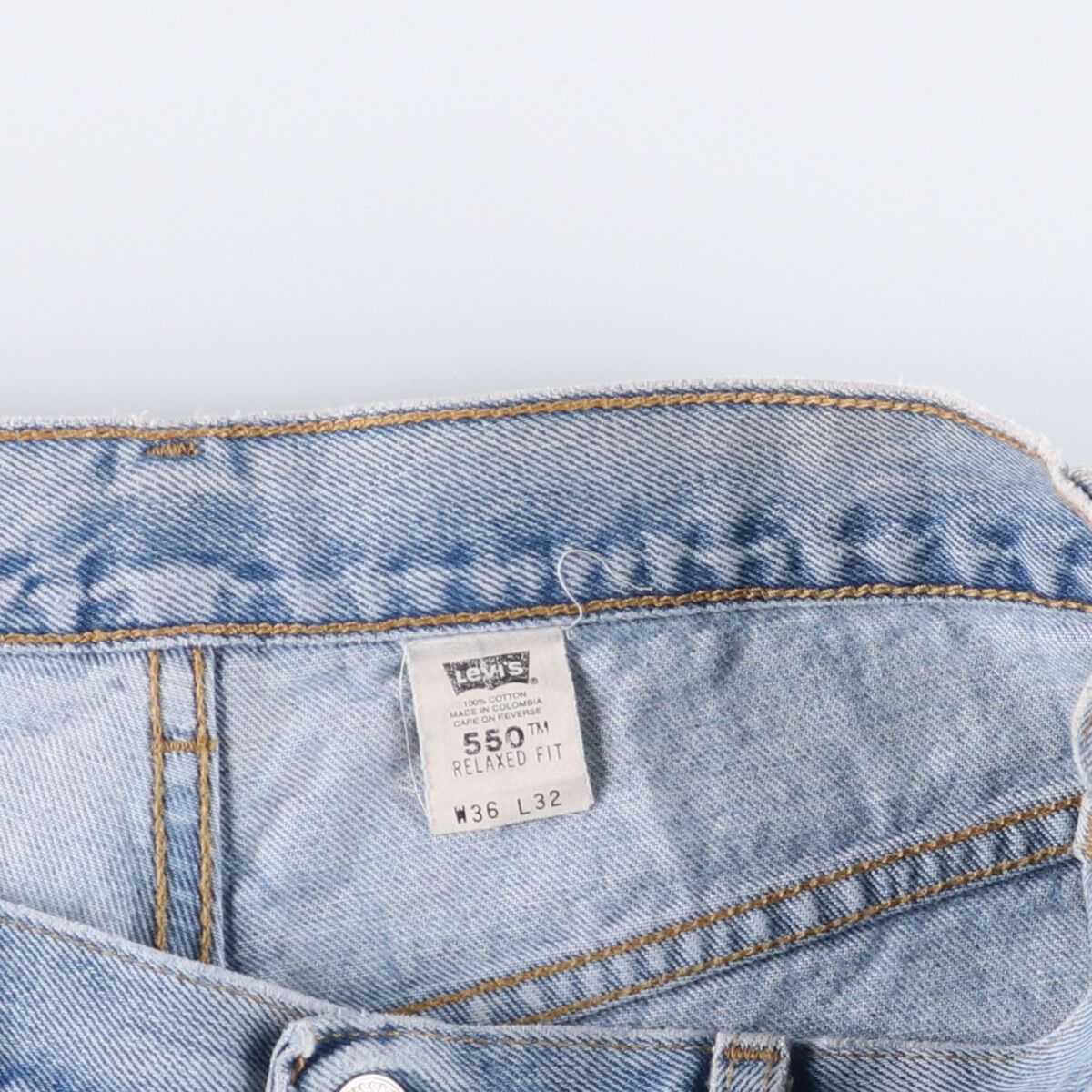 テーパードデニムパンツ