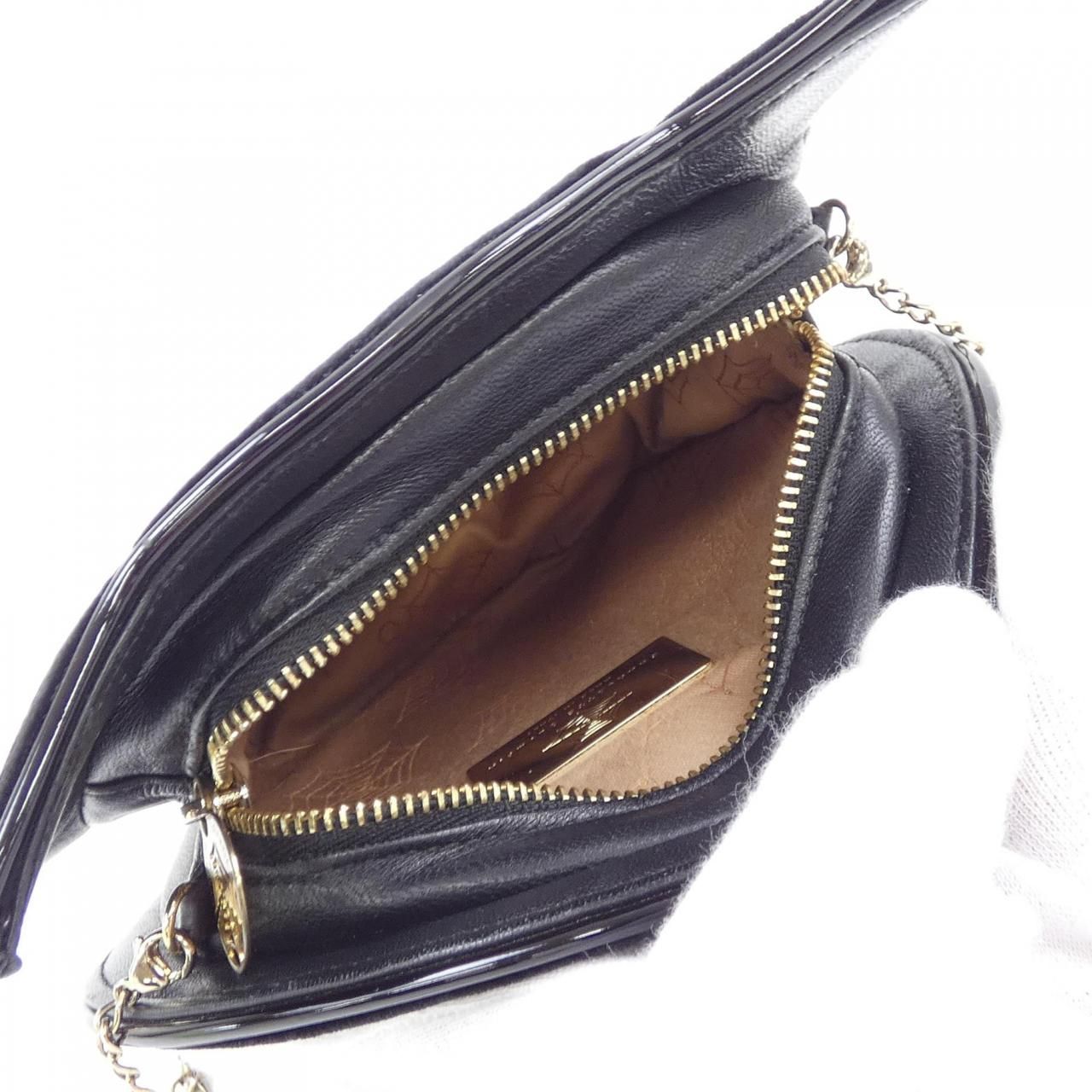 Charlotte Olympia KISS.jpg