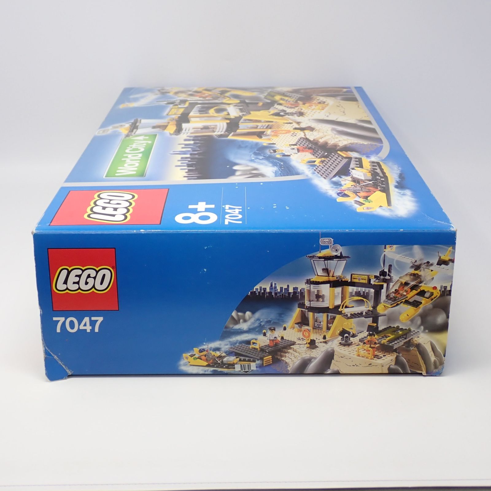 7047