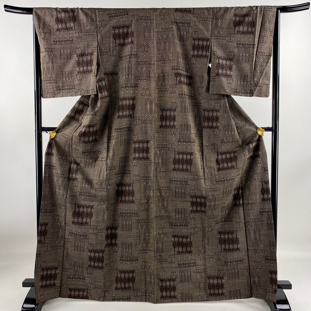 大島紬 身丈167.5cm 裄丈66.5cm M 袷 純泥染 証紙 幾何学模様 花 焦 