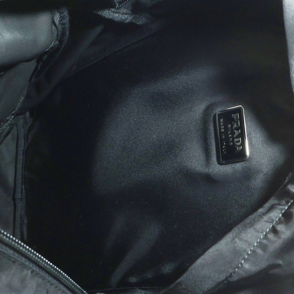 PRADA (プラダ) テスート トライアングルロゴ 三角プレート バック