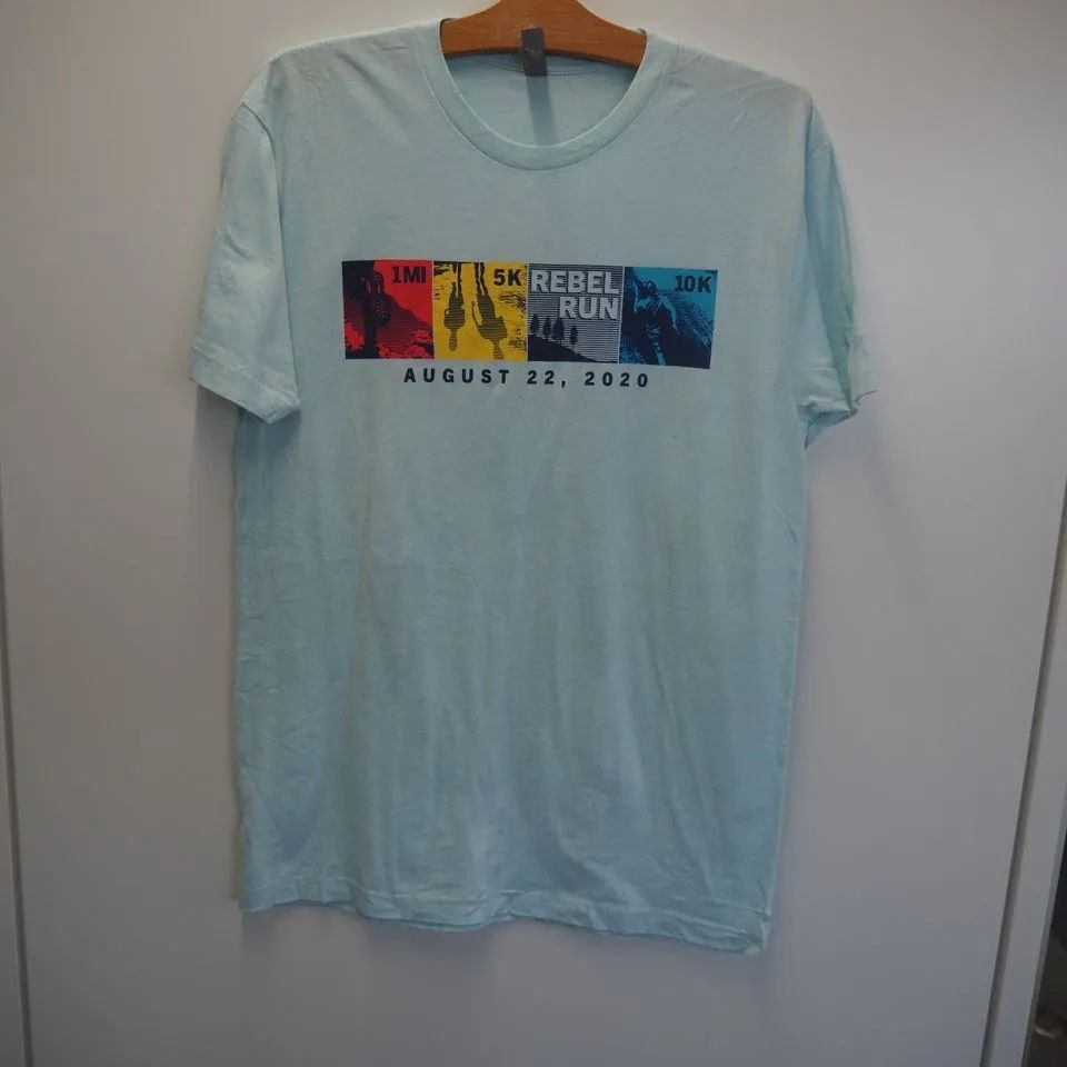 (アメリカ古着) REBEL RUN 薄水色Tシャツ