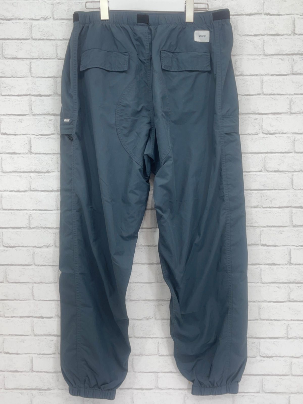 ㉞)WTAPS ダブルタップス 18AW TRACKS TROUSERS NYLON TUSSAH 182GWDT-PTM01 トラックストラウザー  ナイロンパンツ ネイビー - メルカリ