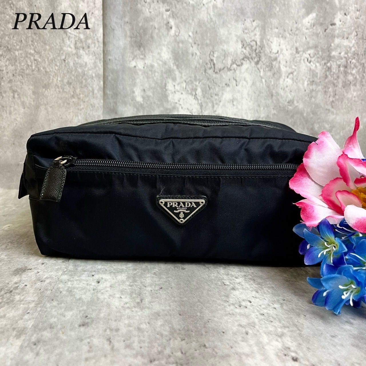 ✨良品✨ PRADA プラダ バニティバッグ 化粧ポーチ 小物入れ 三角ロゴプレート 2NA030 トライアングル シルバー金具 ロゴ型押し テスート ナイロン サフィアーノレザー レディース ブラック 黒色 - メルカリ