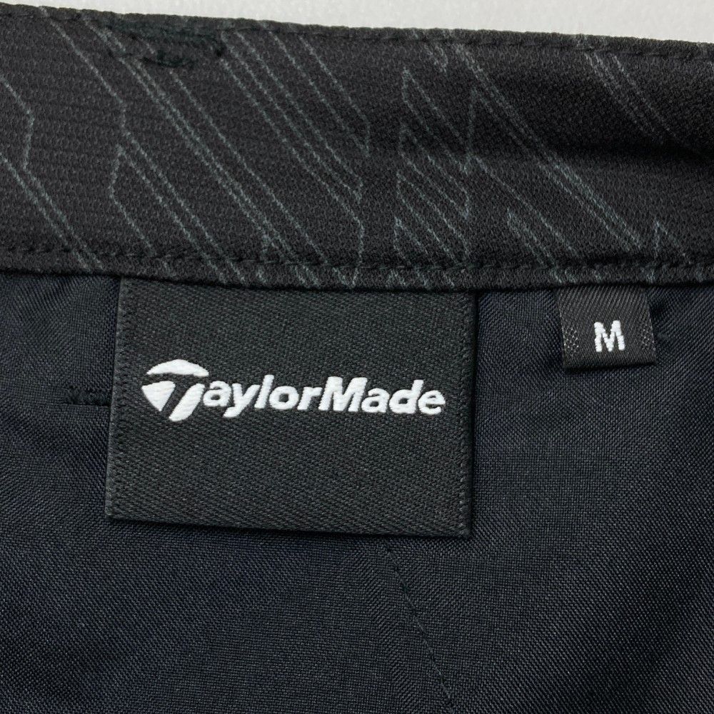 サイズ：M TAYLOR MADE テーラーメイド 2022年モデル ストレッチ ショートパンツ 総柄 ブラック系 [240101239228]# ゴルフウェア レディース ストスト