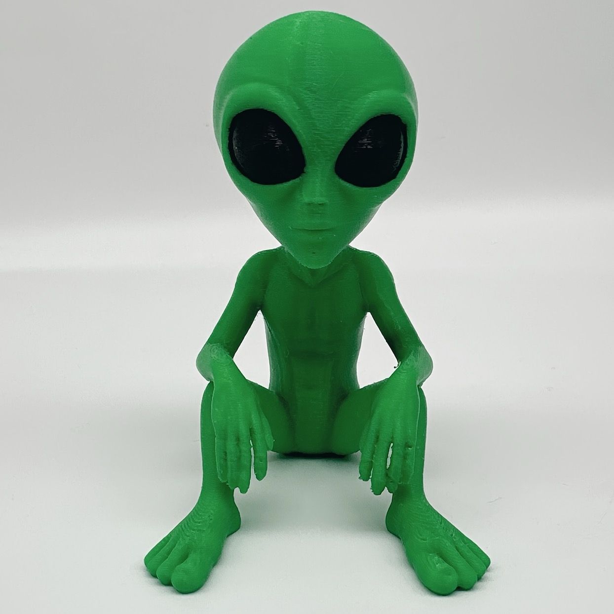 宇宙人フィギュア 青緑色 フィギュア 座っている宇宙人 グリーン 緑 リアル 置物 8cm