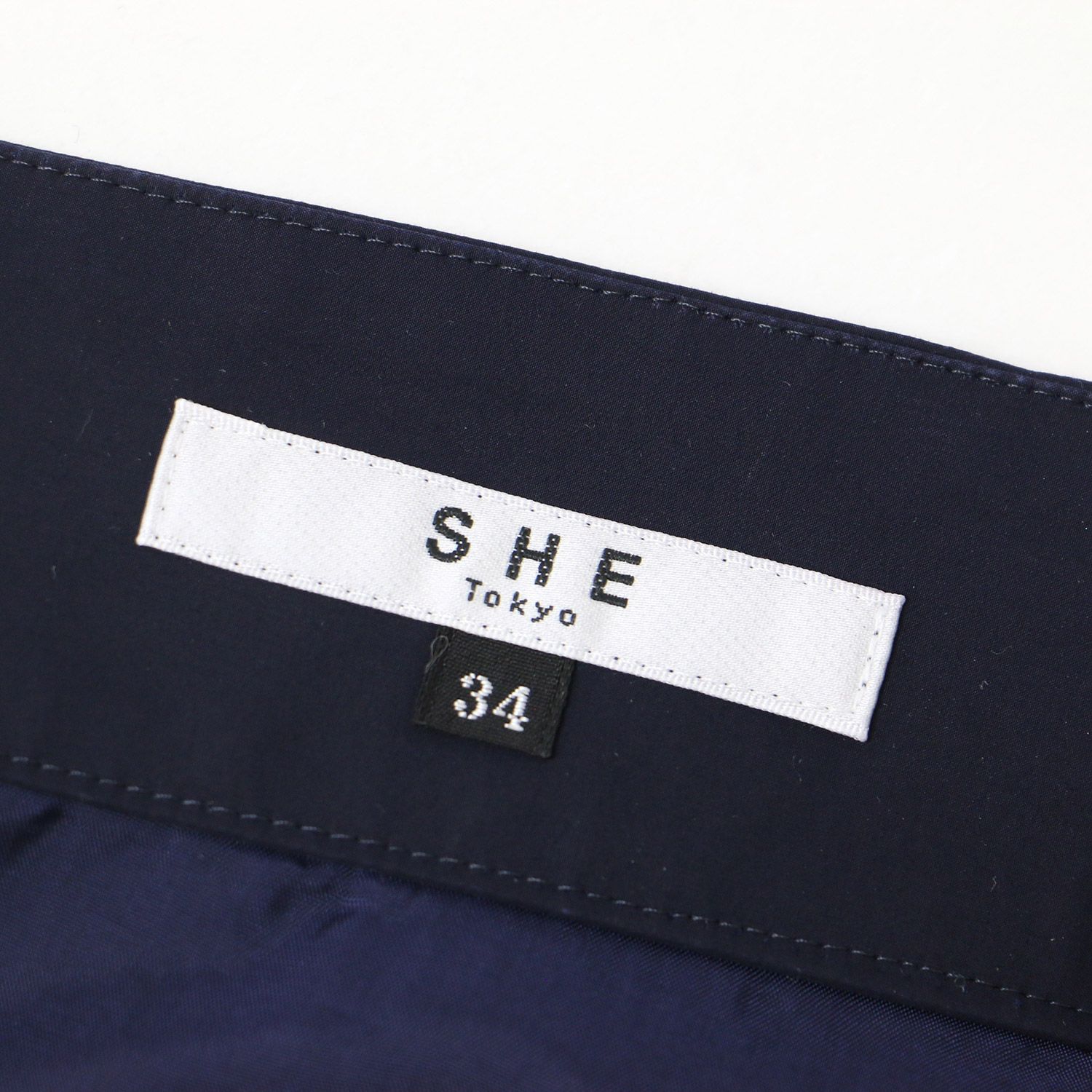 シートーキョー SHE Tokyo Georgia ネイビー　34 SHE Tokyo シートーキョー スカート ネイビー 紺 サイズ:34(XS