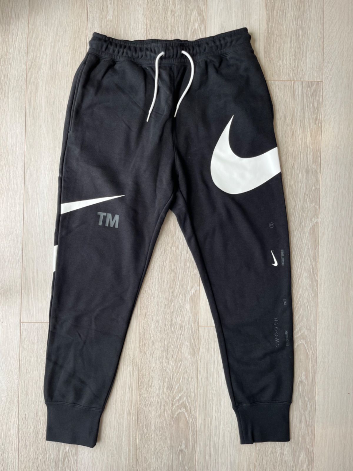 NIKE 新品 スウッシュ スウェット セットアップ - メルカリ