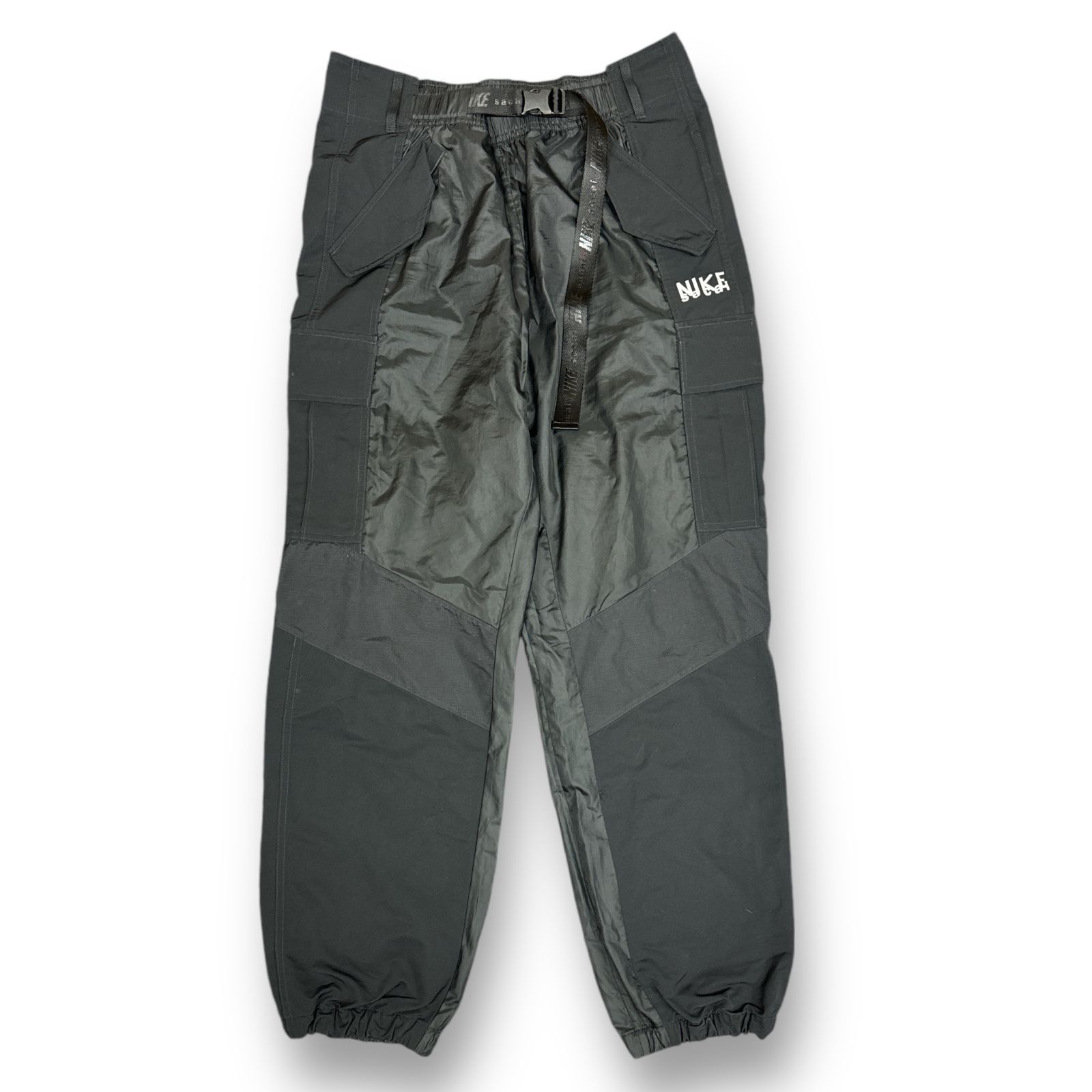 Sacai × NIKE 22AW AS U NRG Pant コラボ ロゴプリント 切替 ナイロン カーゴパンツ サカイ ナイキ  DQ9061-010 ブラック L 76202A4 - メルカリ