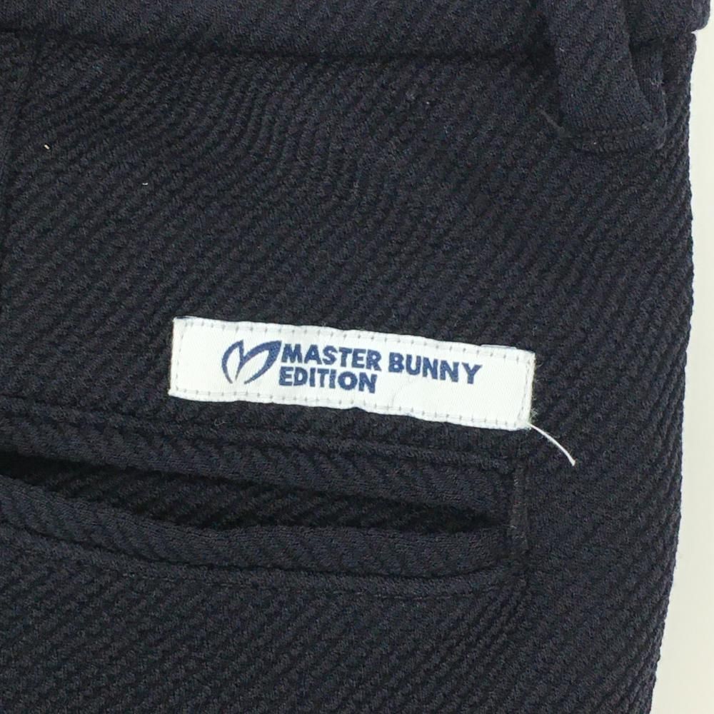 MASTER BUNNY EDITION - 【美品】マスターバニー パンツ 黒系 織生地 ロゴ白 ストレッチ  メンズ 4(M) ゴルフウェア MASTER BUNNY EDITION 美品】マスターバニー パンツ 黒系 織生地 ロゴ白 ストレッチ