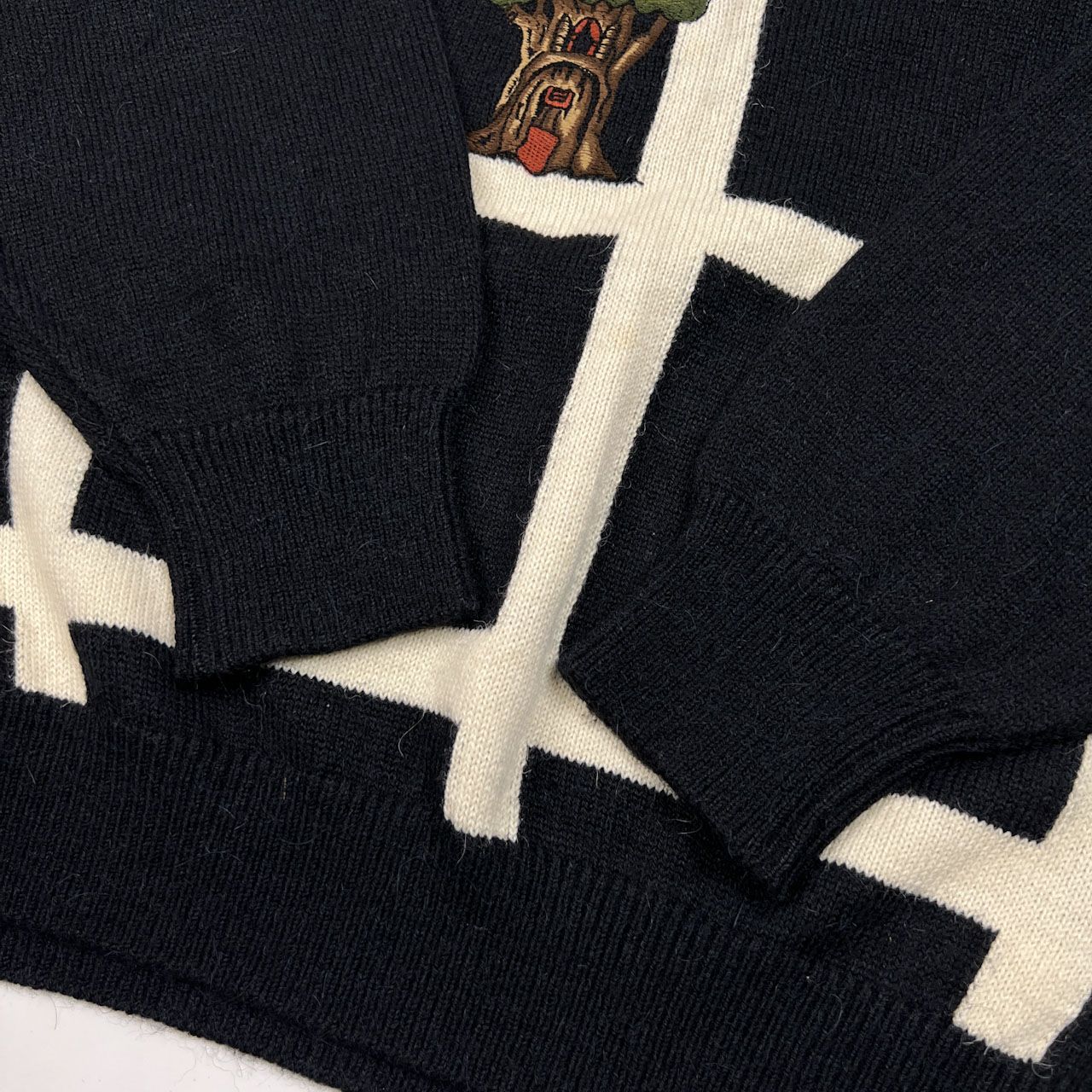 PIASPORTS ピアスポーツ キャラ刺繍 チェック柄風 ウールニット 