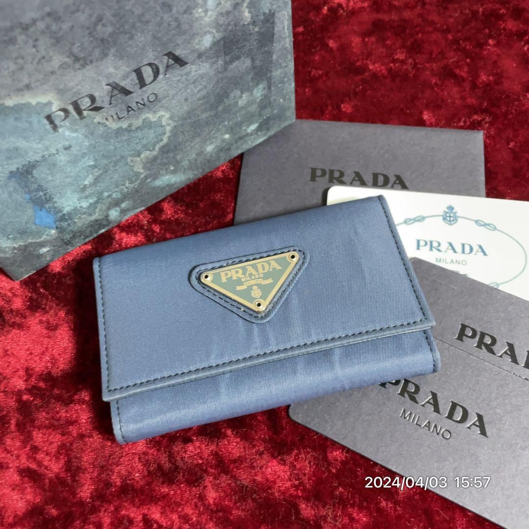 美品 PRADA プラダ 6連 ナイロン ロゴプレート キーケース 箱付 - メルカリ