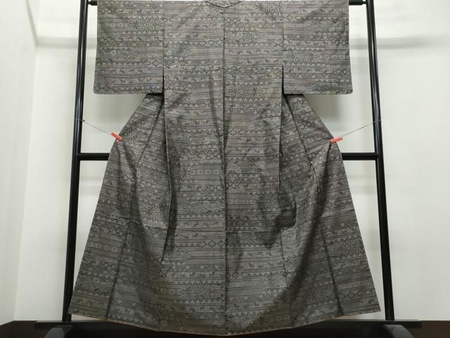 平和屋着物○本場大島紬 9マルキ 吉祥花文 正絹 逸品 未使用