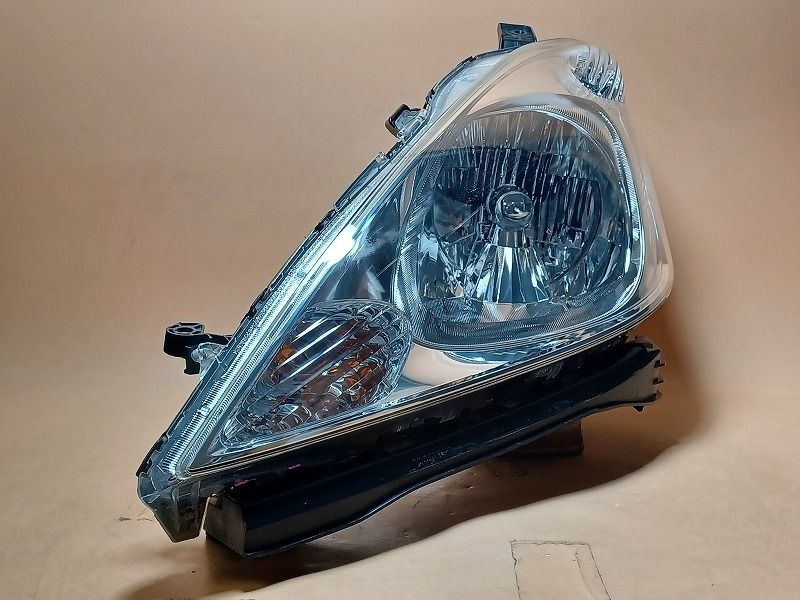 コーティング済 フィットシャトル GG8 左ヘッドランプ ヘッドライト 15X Lパッケージ スタンレー P6869 33151-TF7-J11 NH624P