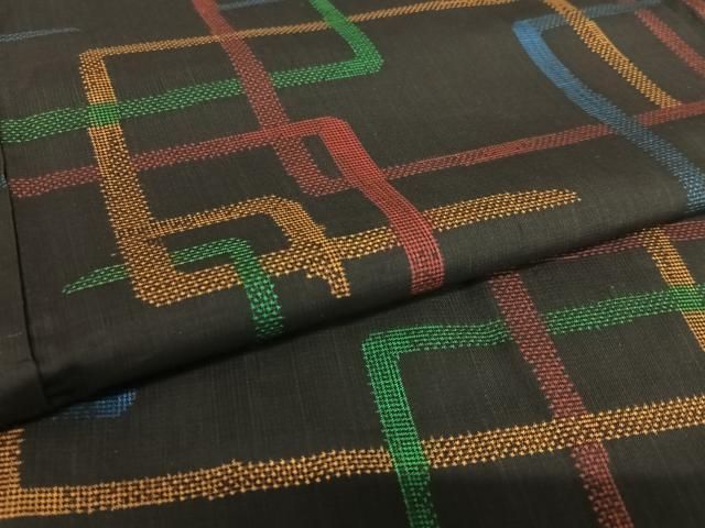 平和屋着物○本場大島紬 一元7マルキ 幾何学文様 黒地 正絹 逸品