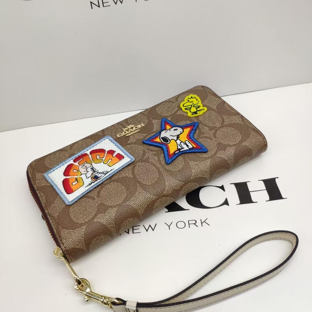 コーチ新品【COACH X PEANUTS】ロング ジップ アラウンド ウォレット・シグネチャー キャンバス・パッチ - メルカリ