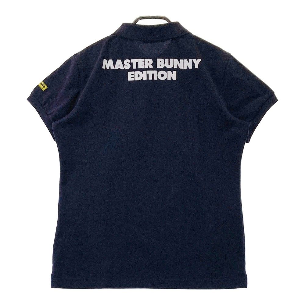 サイズ：2 MASTER BUNNY EDITION マスターバニーエディション BATMAN バットマン 半袖ポロシャツ 10周年  ネイビー系 [240101447388] ゴルフウェア レディース ストスト サイズ：2 MASTER BUNNY EDITION マスターバニーエディション